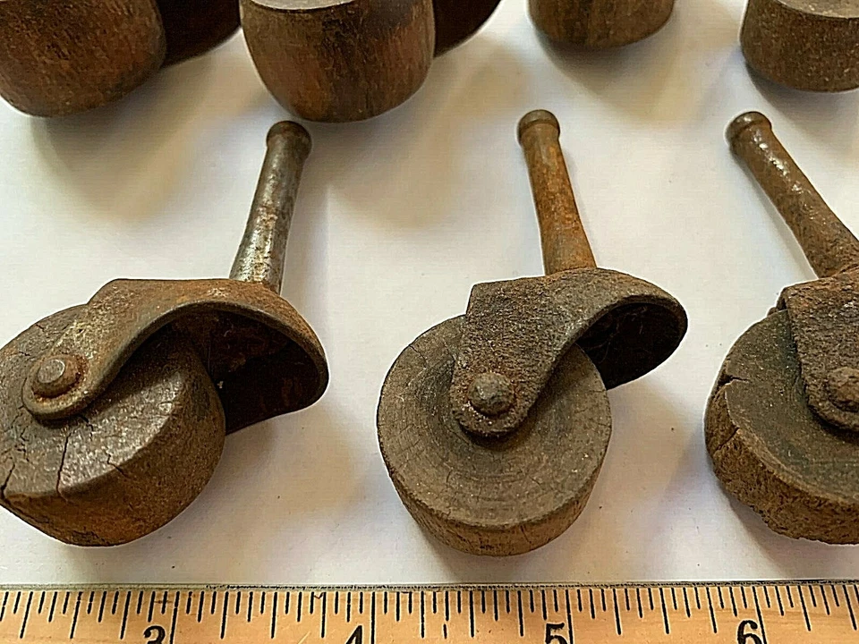 Lot of 7 Antique Victorian Cast Iron Furniture Castors with wooden Wheels  - Image 3 of 4