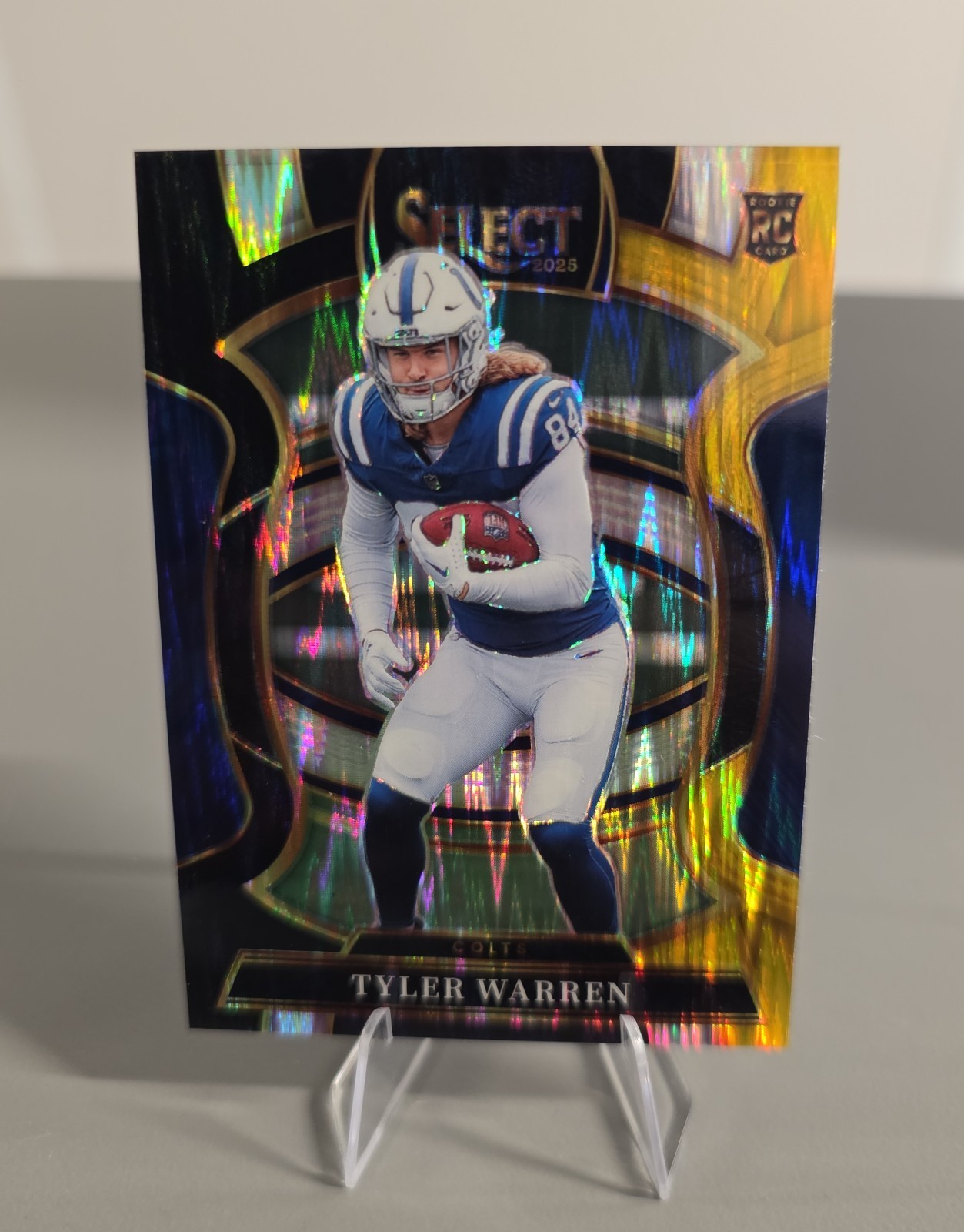 2025 Panini Select - Concourse Tyler Warren #33 Black & Gold Shock Prizm (RC)