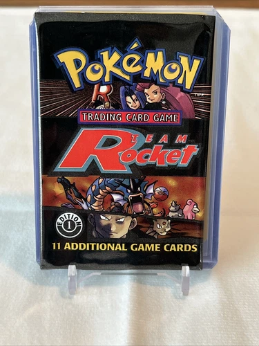 (vintage) 1st Edition Booster Pack Opened WOTC w/ all 11 Team Rocket Cards.