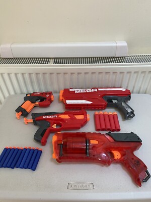 Nerf Mega Magnus, Bigshock, Hotshock, Strongarm Spielzeugpistolen + Darts Konvolut.