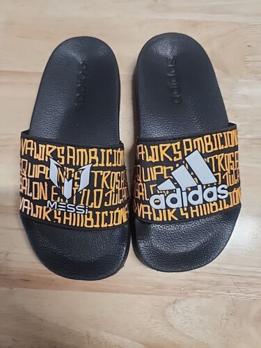 Adidas Messi Adilette Shower GW6136 Kids Black/Semi Solar Gold Slide Shoes HY183