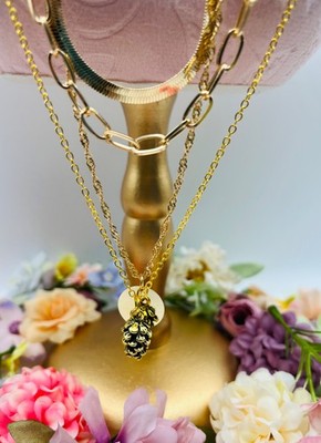 layered gold tone necklace four different styles to wear together or separate