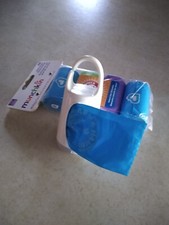 Munchkin  Arm and Hammer Diaper Bag Dispenser With Extra Diaper Disposal Bags