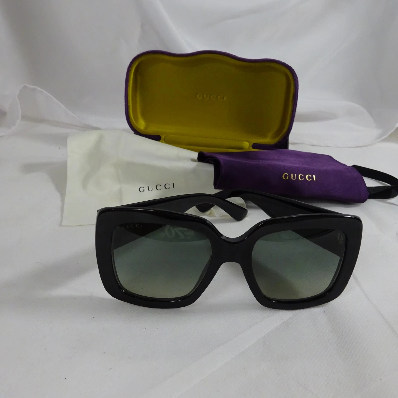 Lunettes de soleil monture logo carré noir acétate Gucci GG0141S avec accessoires