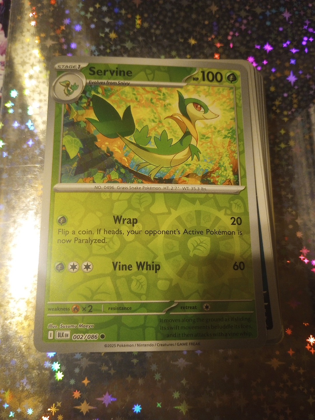 Servine Reverse Holofoil 002/086 Pokemon Card SV: Black Bolt Mint