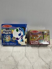 Melissa  Doug music maker and Melissa  Doug 2 in 1 puzzle