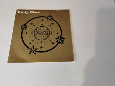 TRICKY DISCO.       VINYL 7'' SINGLE.   TRICKY DISCO     WARP. 7WAP7.      1990