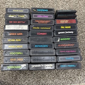 Atari 2600 System Bundle with Console, 30 Games, Joystick, Paddles, and More LOT