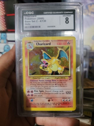 Charizard graded CGC 8 for sale on eBay