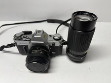 Canon AE-1 35mm SLR Film Camera with 2 Len Tested and Working Read Description