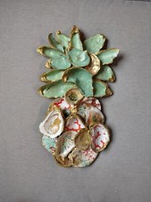 Handpainted oyster shells In The Shape Of a pineapple. Wood Back Board To Hang.