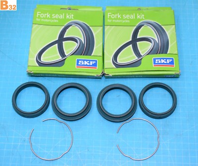 2x SKF KITG-48S 48x58x8,5 Spy Dichtungssatz / Gabel Staubkappen NEU