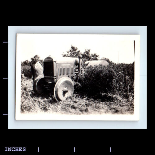 Vintage Photo WOMAN BY MCCORMICK DEERING FARM TRACTOR - Picture 1 of 2