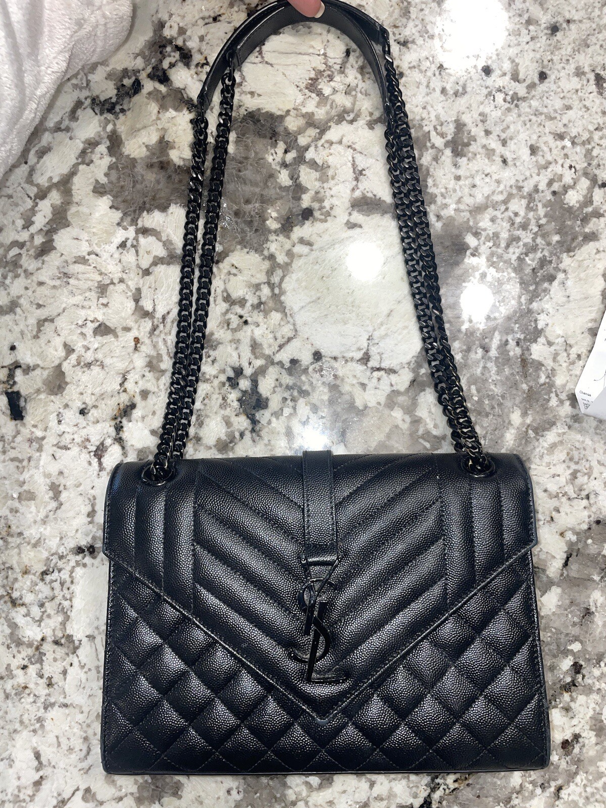 Busta Saint Laurent media in pelle goffrata grain de poudre trapuntata YSL