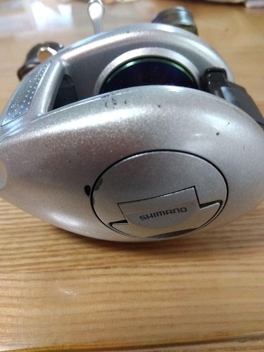 Shimano Metanium 00 MG Fishing Bait Reel Right Handle Silver - Picture 7 of 13