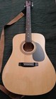 A Good Looking Johnson Acoustic Guitar with A Good Set Of Strings, Strap, & Case