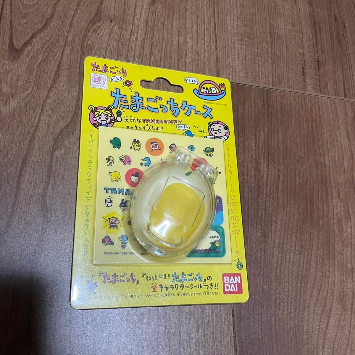 New Yellow Bandai Tamagotchi Official Clear Egg Case + New Species