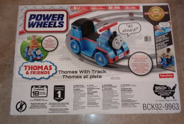 power wheels ride on train with track