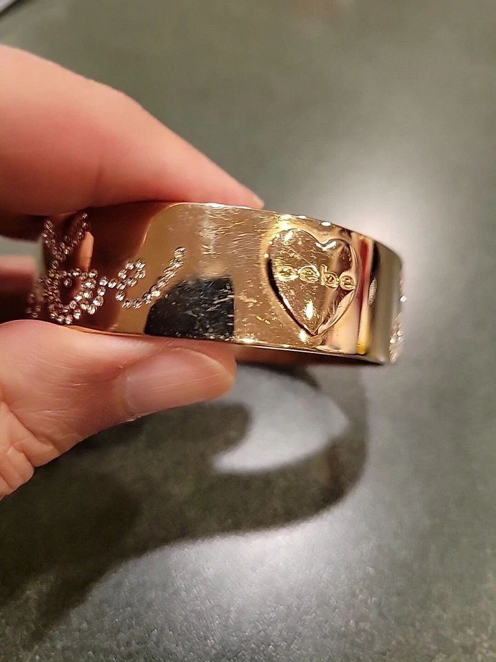 Bebe Gold Tone and Rhinestone Love Bangle - Image 4 of 4