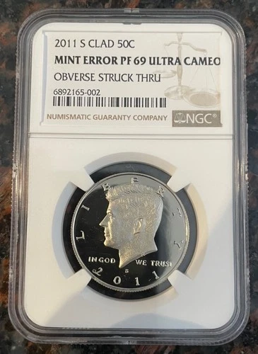 2011-S CLAD Kennedy Half Dollar NGC Proof 69 (PF69) – Strike Thru Mint Error