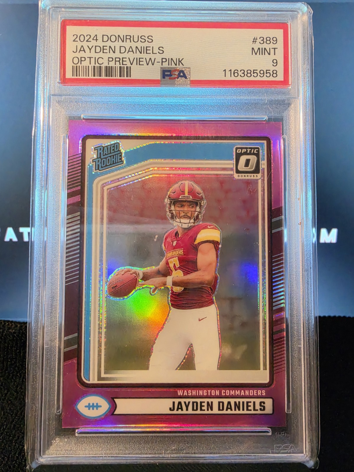 Panini 2024 Donruss Rated Rookie Jayden Daniels Optic Pink Prizm #389 PSA 9 view 1