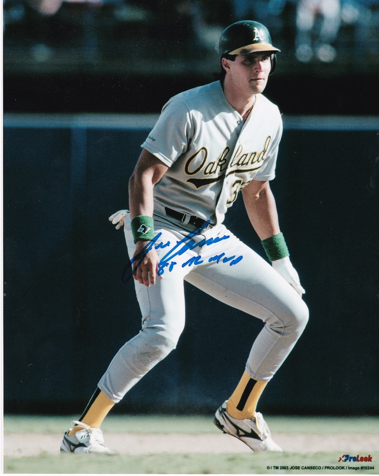 JOSE CANSECO OAKLAND A'S 1988 AL MVP ACTION SIGNED 8x10 