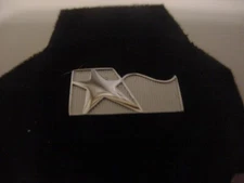 Texas International Silver-tone, One Year Service Pin.  New Condition