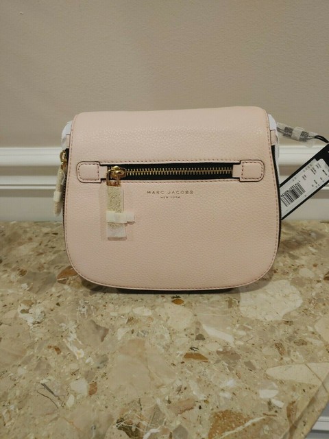 small nomad crossbody bolsa