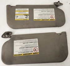 02-04 Ford F250 F350 F450 F550 XLT Sun Visor MED Flint Pair W/ Mirror Cloth