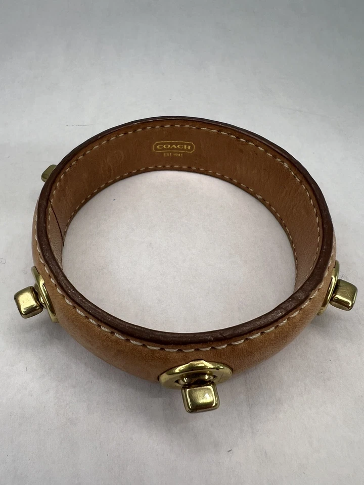 Auténtica pulsera de cuero Coach Turnlock Foto 4 de 4