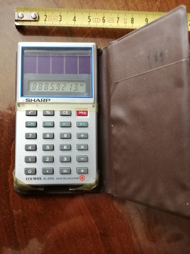 Calculatrice sharp solaire Vintage +étui  - Photo 1/2