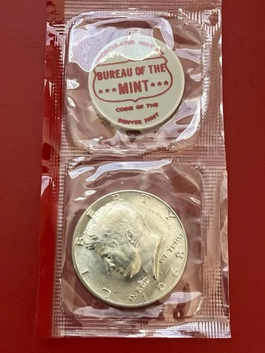 1968 D Kennedy half dollar 40% Silver w/ Off Center Print on Token Uncirculated