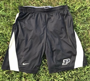 black and university gold shorts