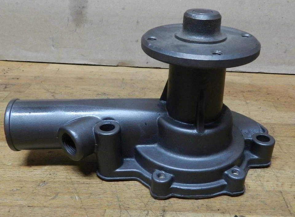 Datsun 410 411 520 521 1965-69 1,2 L, 1,3 L 4 cilindros bomba de agua nueva Foto 2 de 4