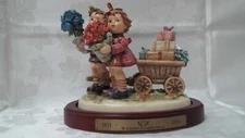 Goebel Hummel collectible figurine "Love's Bounty" #004