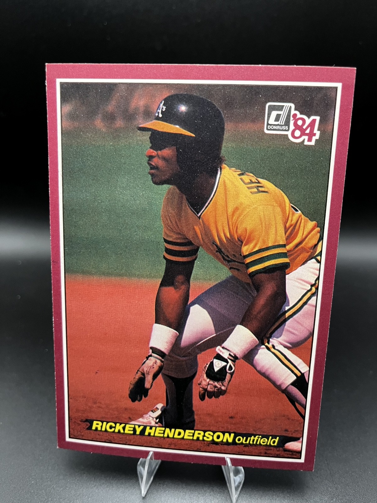 Rickey Henderson #9 (Baseball Cards 1984 Donruss Action All Stars) — is it worth grading?
