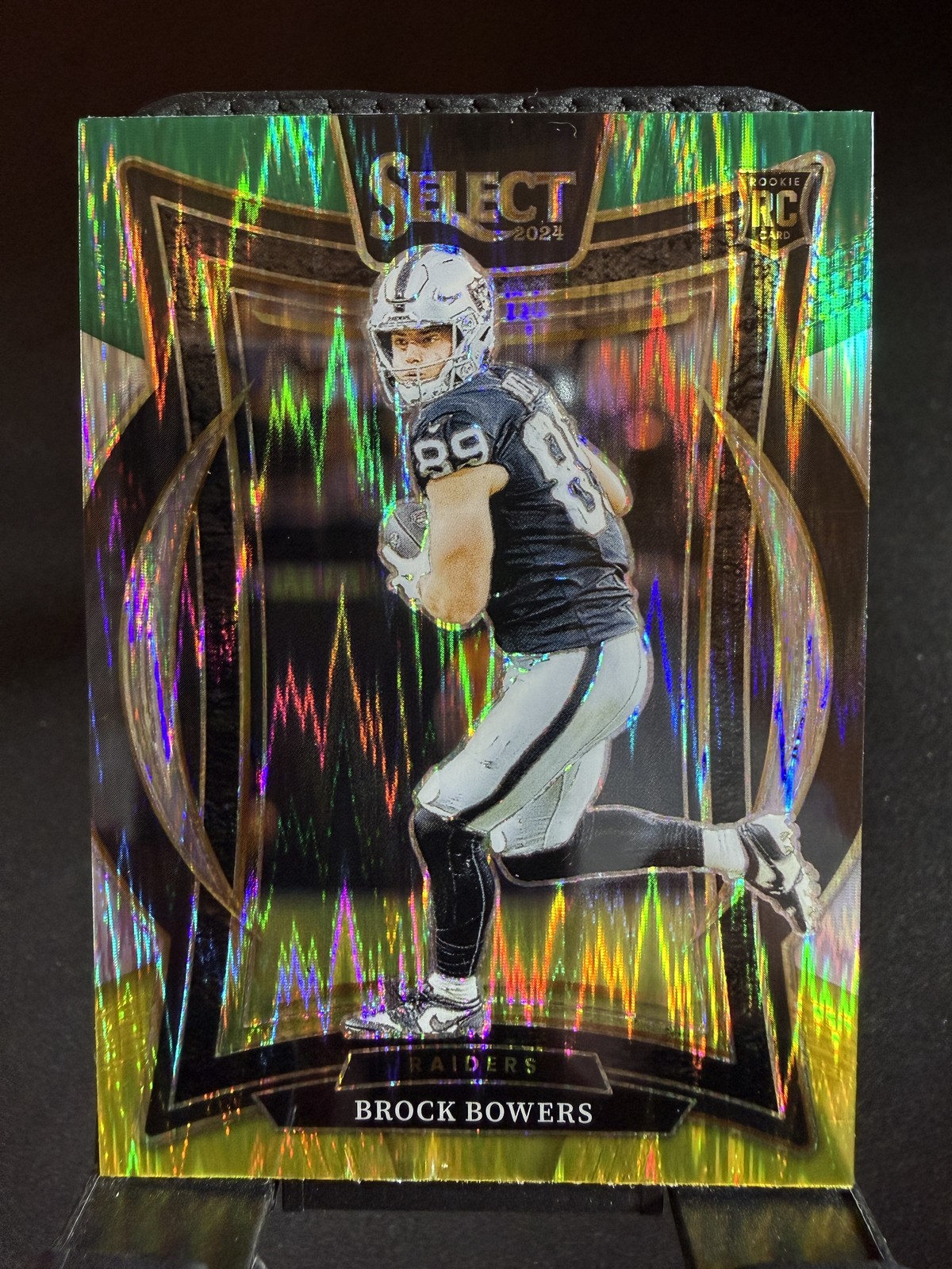 2024 Panini Select #31 Brock Bowers Green & Yellow Prizm Shock