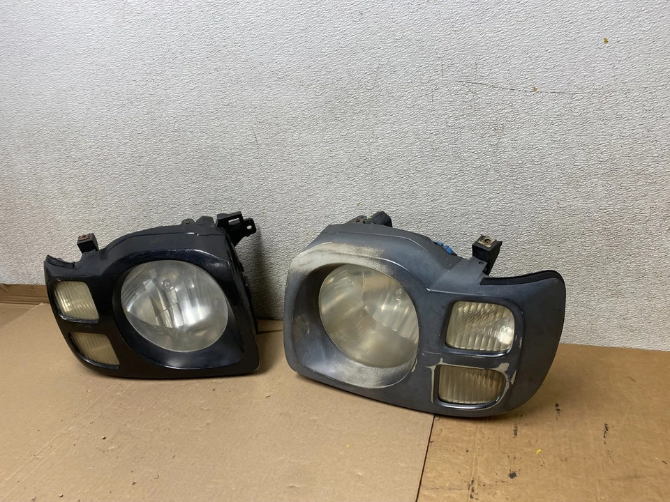 Faros laterales izquierdo+derecho Nissan Xterra 2002 2003 2004 OEM U0927 DW Foto 2 de 4