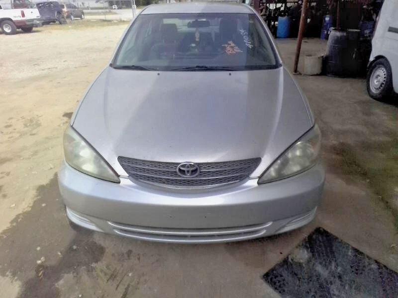 Toyota Camry 2002-2003 husillo delantero derecho pasajero nudillo 4 cilindros con ABS fabricante original Foto 4 de 4