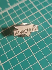 Vtg Anschutz Logo German Firearms Gun Silver Tone Lapel Pin