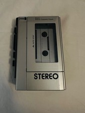 silver stereo cassette player with plastic case vintage Sears