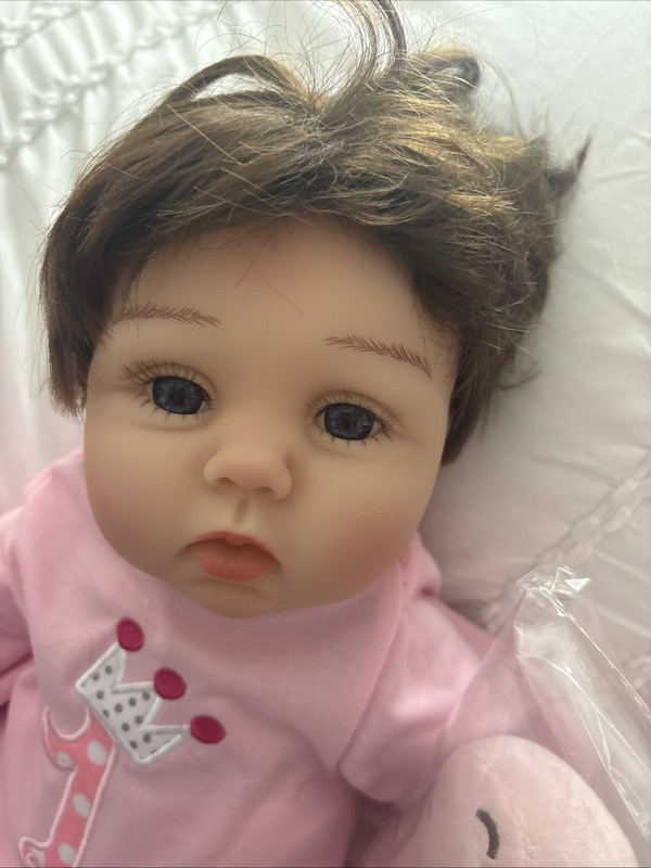  Reborn Baby Girl with Brown Hair and Big Dark Eyes.  