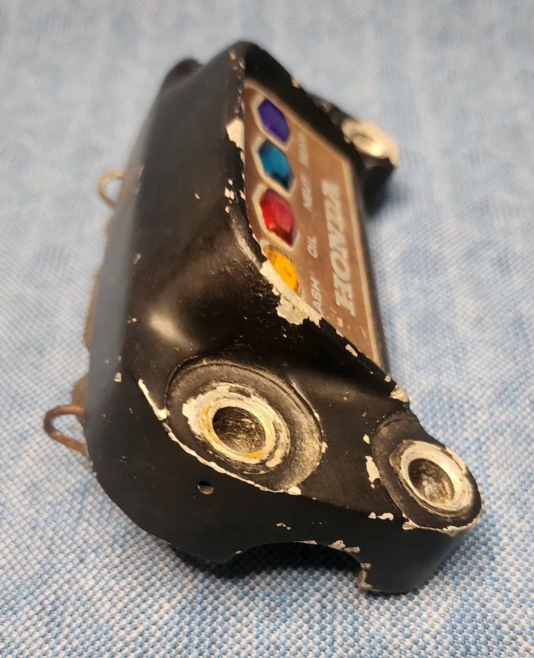 Abrazadera de soporte de manillar luz indicadora Honda CB350F-500-550-750 usada de colección Foto 3 de 4