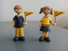 Set Of 2 Suzi Skoglund University of Michigan fans resin figurines