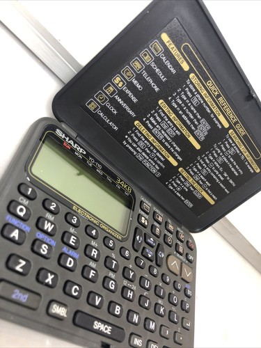 Organisateur électronique portable Sharp YO-110 gris 34 Ko - Nécessite des piles neuves - Photo 2 sur 13