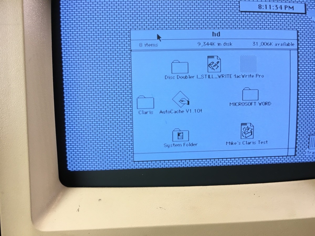Vintage Macintosh SE with keyboard, two mice and an Vintage Macintosh SE with keyboard, two mice and an