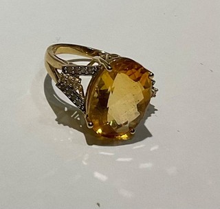 Women’s 10K gold ring size 7 likely citrine gemstone oval 4 prong setting