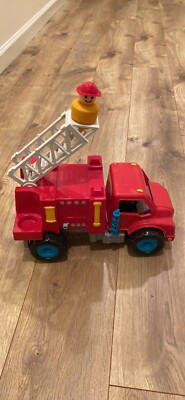 battat red heavy plastic  firetruck with firemen 