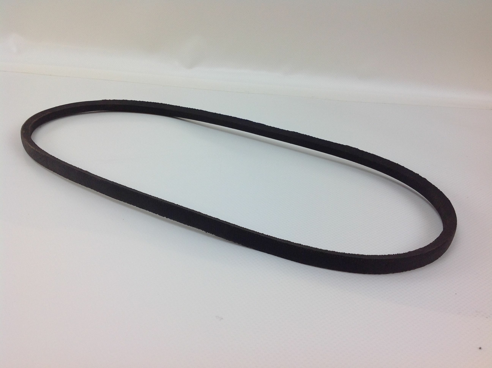 Z26: Cinghia liscia trapezoidale per tagliaerba autotreni, modello ES464TR, lunghezza esterna: 698 mm, sezione: 10 x 6 mm, n. origine: 35063750/0