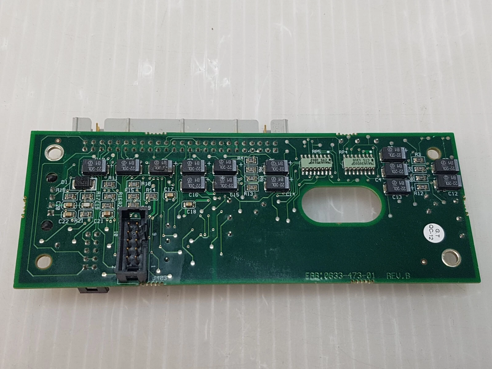 Back side of the Lumenis 0633-474-01-C pyro board with surface-mount parts